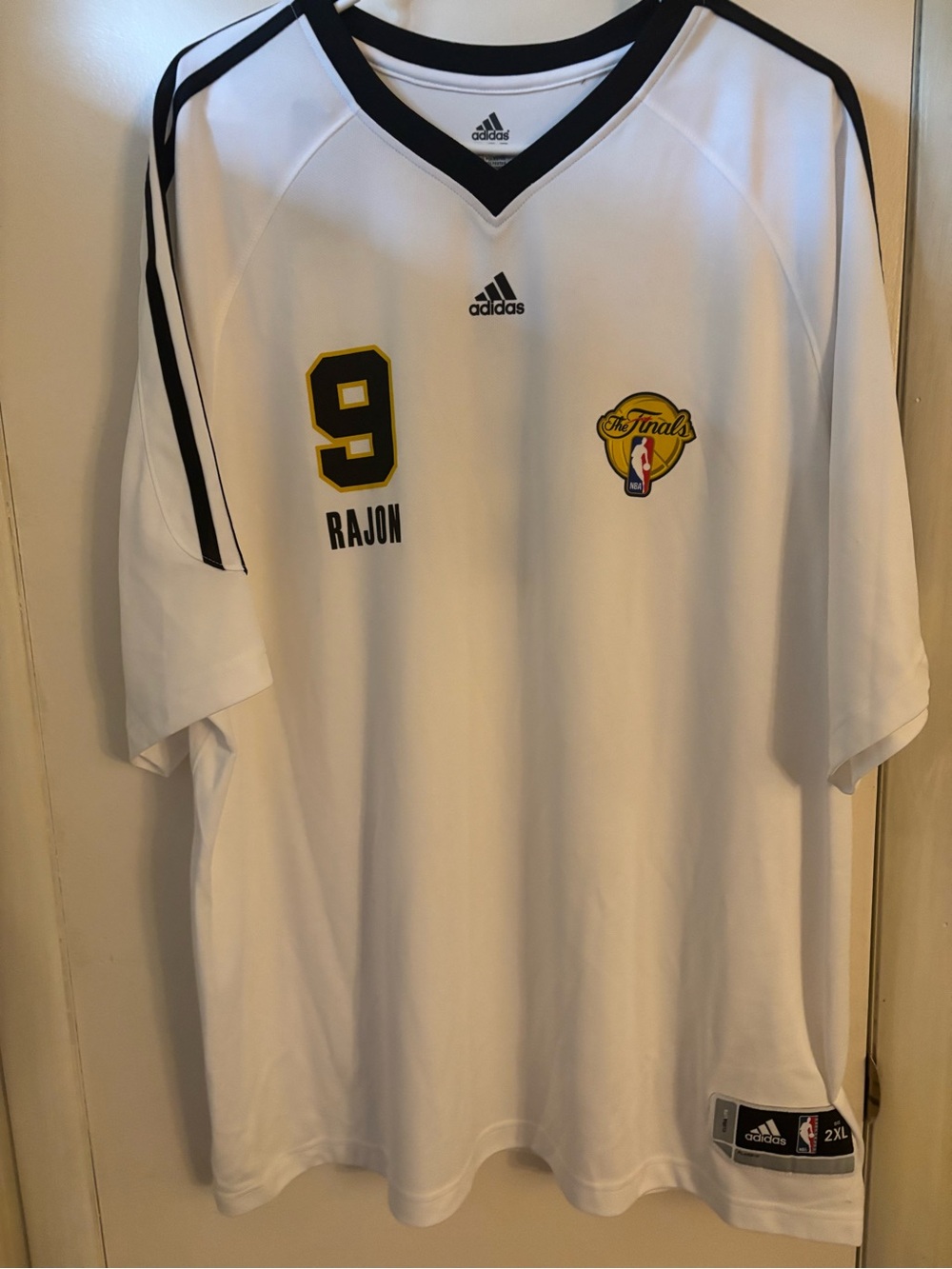 adidas Men’s White Basketball Jersey with Black Trim and Yellow Accents